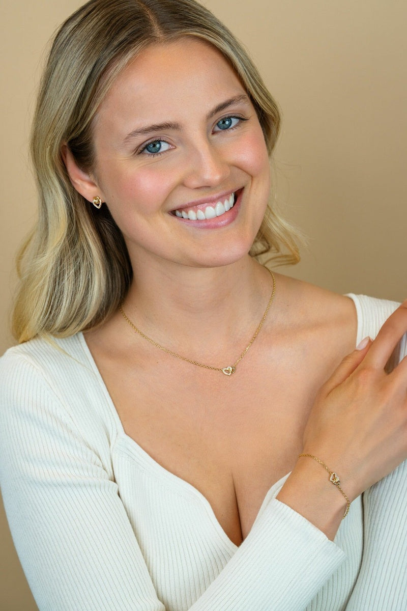 ZINZI gold plated zilveren armband met verbonden hartjes, witte zirkonia's 17-19cm - ZIA2493Y