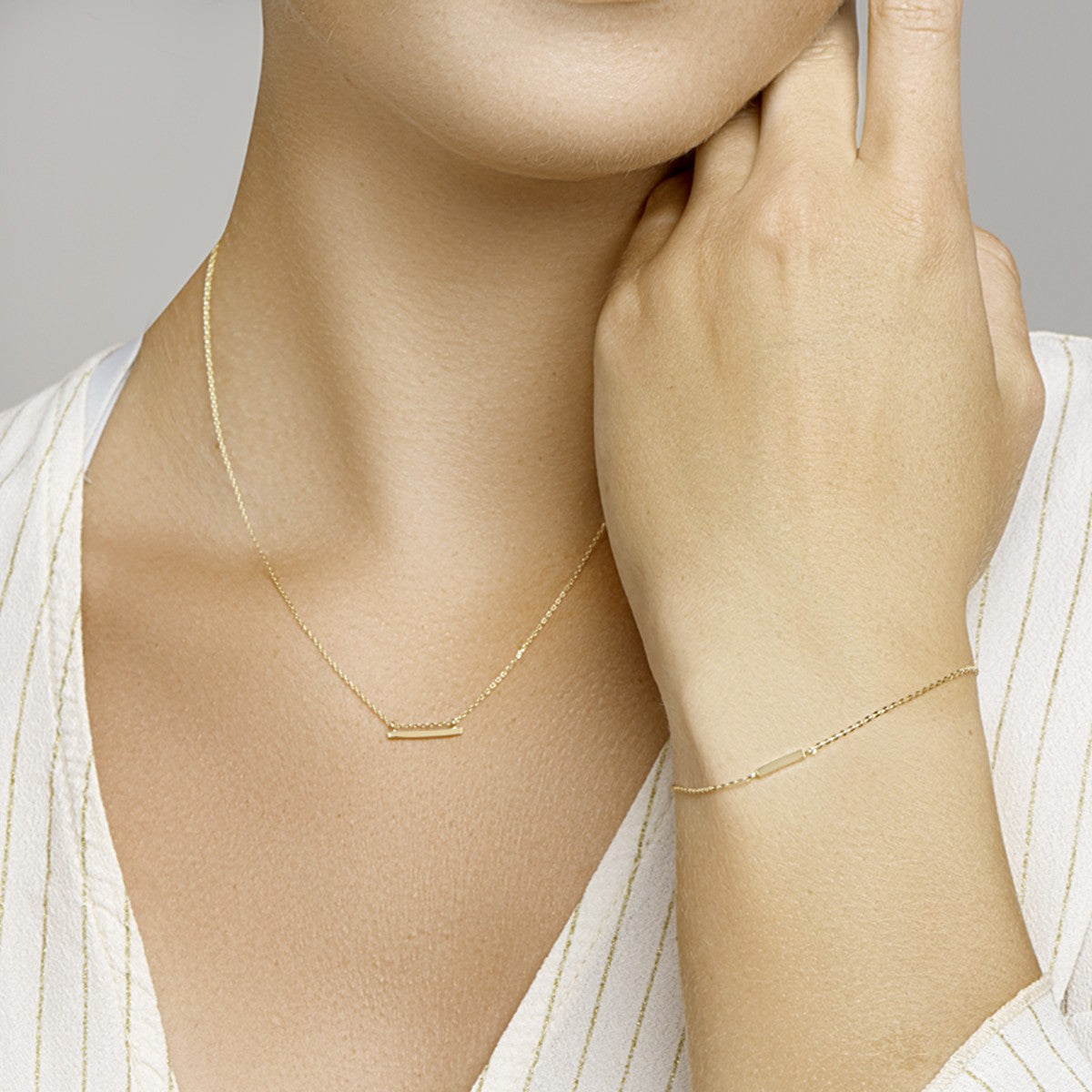 Armband balkje 16,5 - 18,5 cm 14K geelgoud