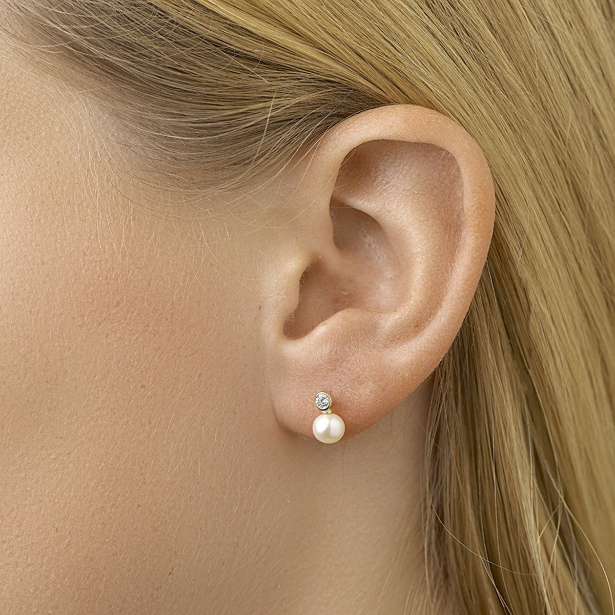 Oorbellen parel en zirkonia 14K geelgoud