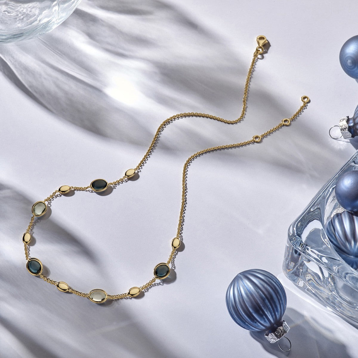 Collier london blue en blauw topaas 7 mm 41 - 43 - 45 cm 14K geelgoud