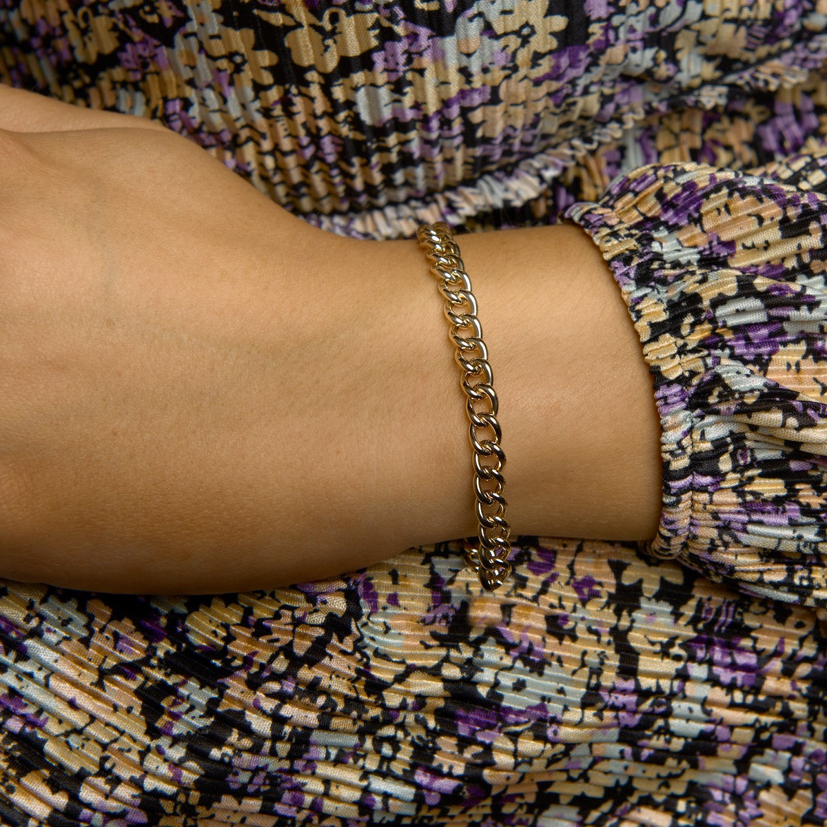 Fantasy Collection Armband gourmette 6,0 mm 19 cm met groot veerslot 14K geelgoud