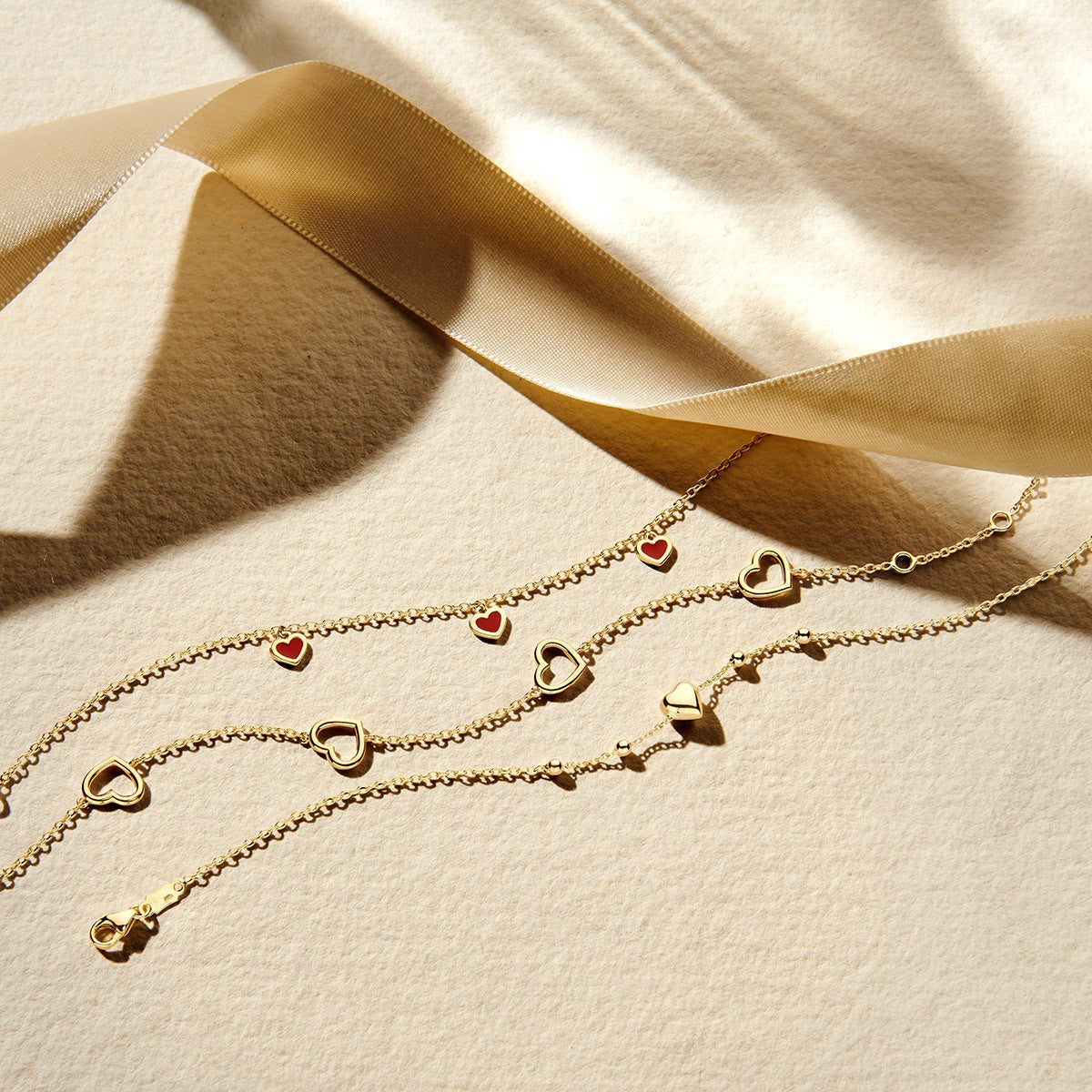 Armband hart en bolletjes 16 – 18 cm 14K geelgoud