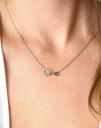 ZINZI zilveren ketting met Infinity teken verbonden met een open hart, bezet met witte zirkonia's 42-45cm ZIC2596 - PansiteNederland.nl