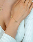 ZINZI gold plated armband met open rondjes & bolstructuur 17-20cm ZIA2704G