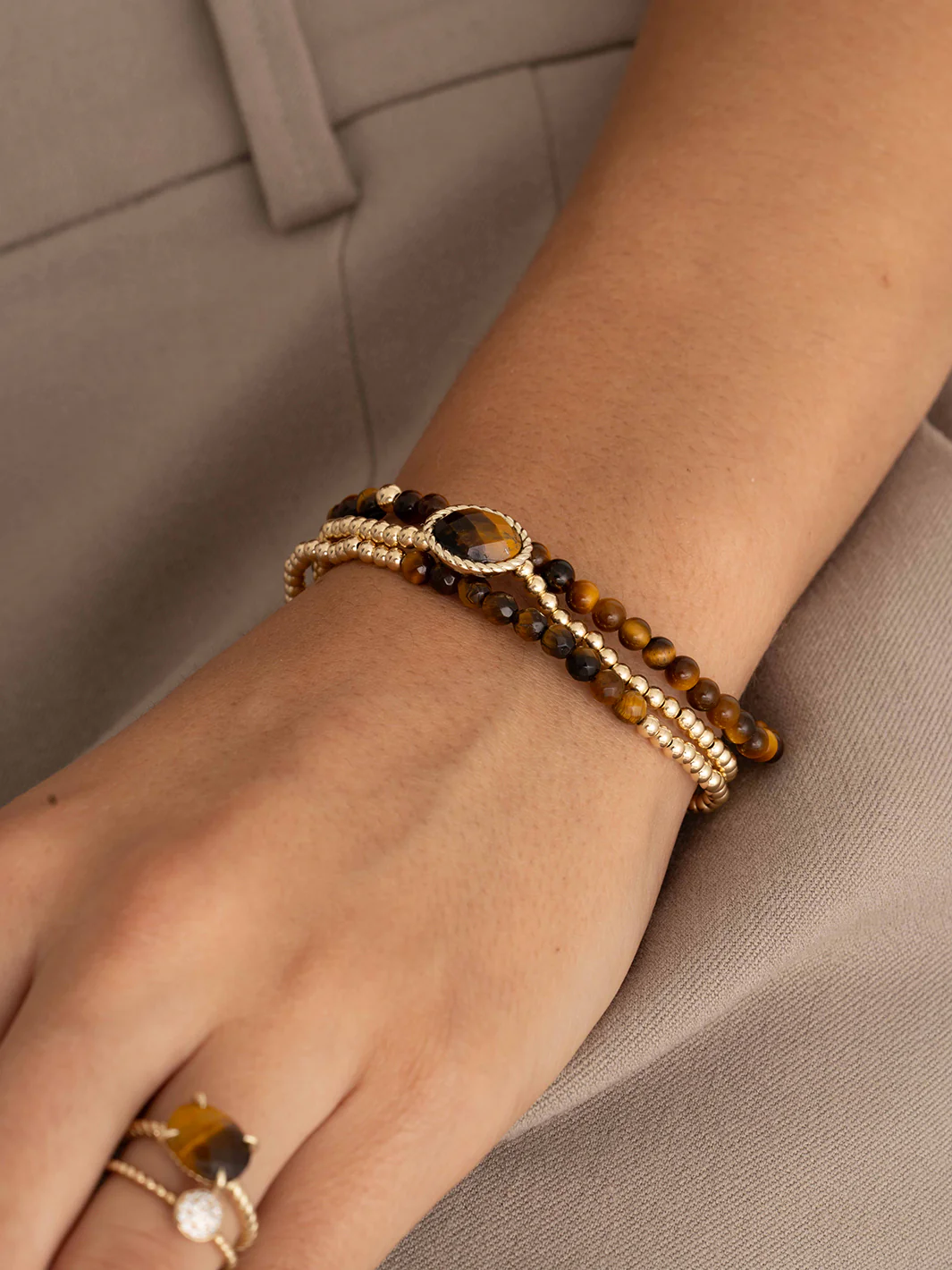 Sparkling Jewels Armband Tijgeroog SBG-GEM09-3MM-LINE Goudkleurig