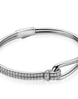 Mart Visser by Zinzi zilveren bangle armband 12mm breed geknoopte vorm bezet met witte zirkonia's MVA19, exclusief en kwalitatief hoogwaardig. Ontdek nu!