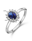 Gerhodineerd Zilver Ring Synth. Saffier En Met Zirkonia Halo 1336563 - PansiteNederland.nl