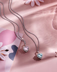 zilver gerhodineerd hanger hart wit en roze zirkonia halo 1336706 - PansiteNederland.nl