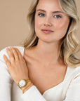 ZINZI Tresor horloge 32mm bezet met witte zirkonia's, parelmoer wijzerplaat en goudkleurige stalen kast en schakelband ZIW2434 + gratis armband t.w.v. 39,95 - PansiteNederland.nl