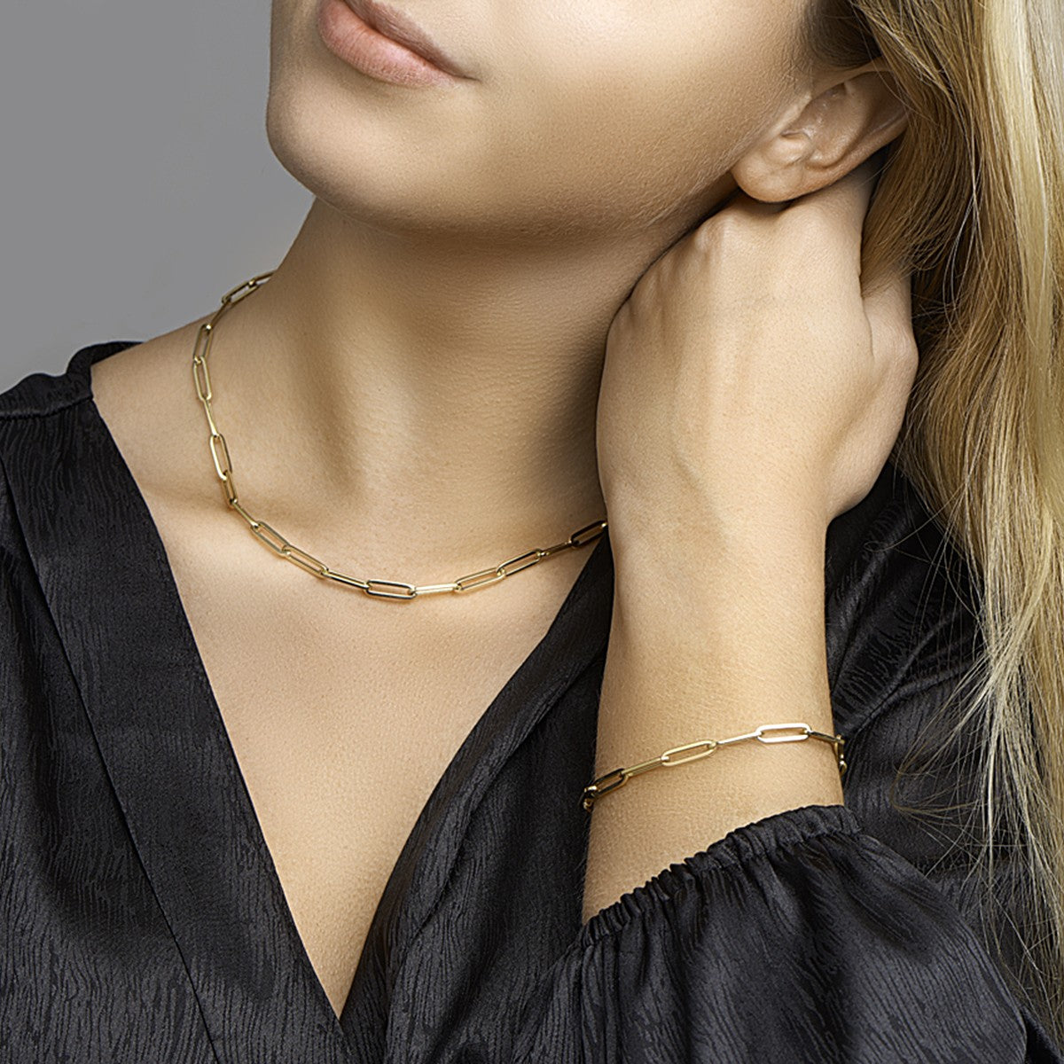 Armband paperclip vierkante buis 4,5 mm 19 cm 14K geelgoud