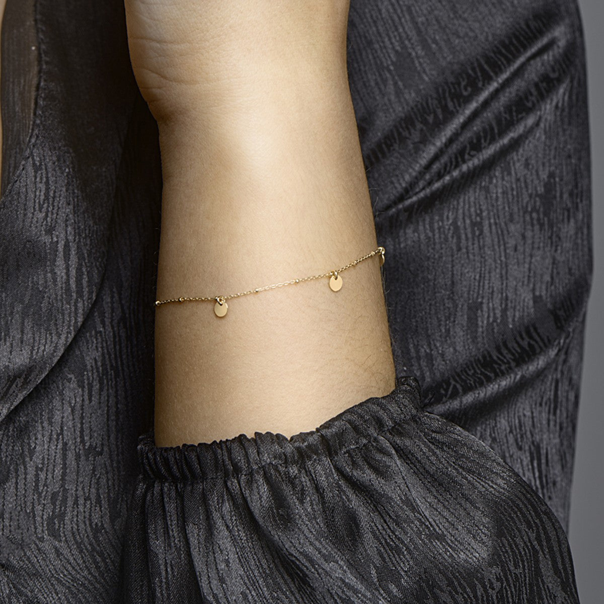 Armband rondjes 16 + 2 cm 14K geelgoud