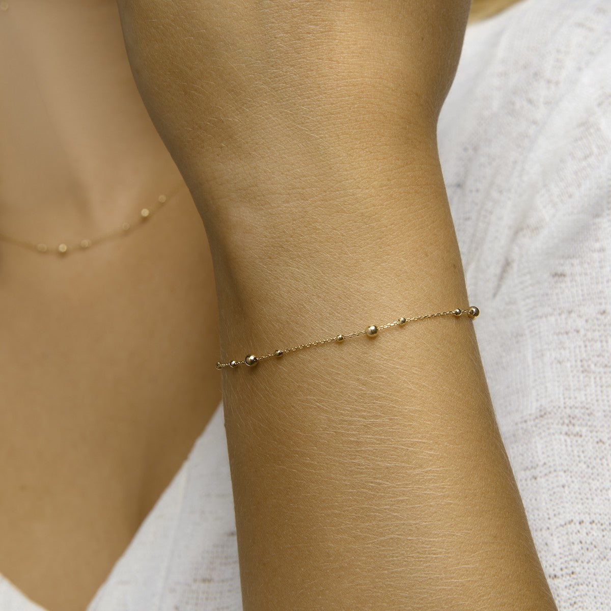 Armband bolletjes 0,8 mm 16,5 - 18,5 cm 14K geelgoud – 4023335
