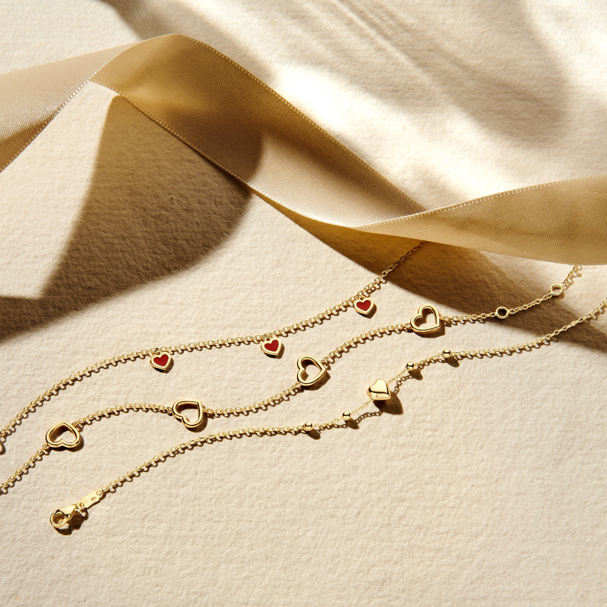 Armband hart en bolletjes 16 – 18 cm 14K geelgoud