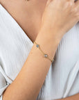 ZINZI gold plated zilveren armband met ronde en vierkante zettingen jeansblauw en witgrijs 17-20cm ZIA2526G