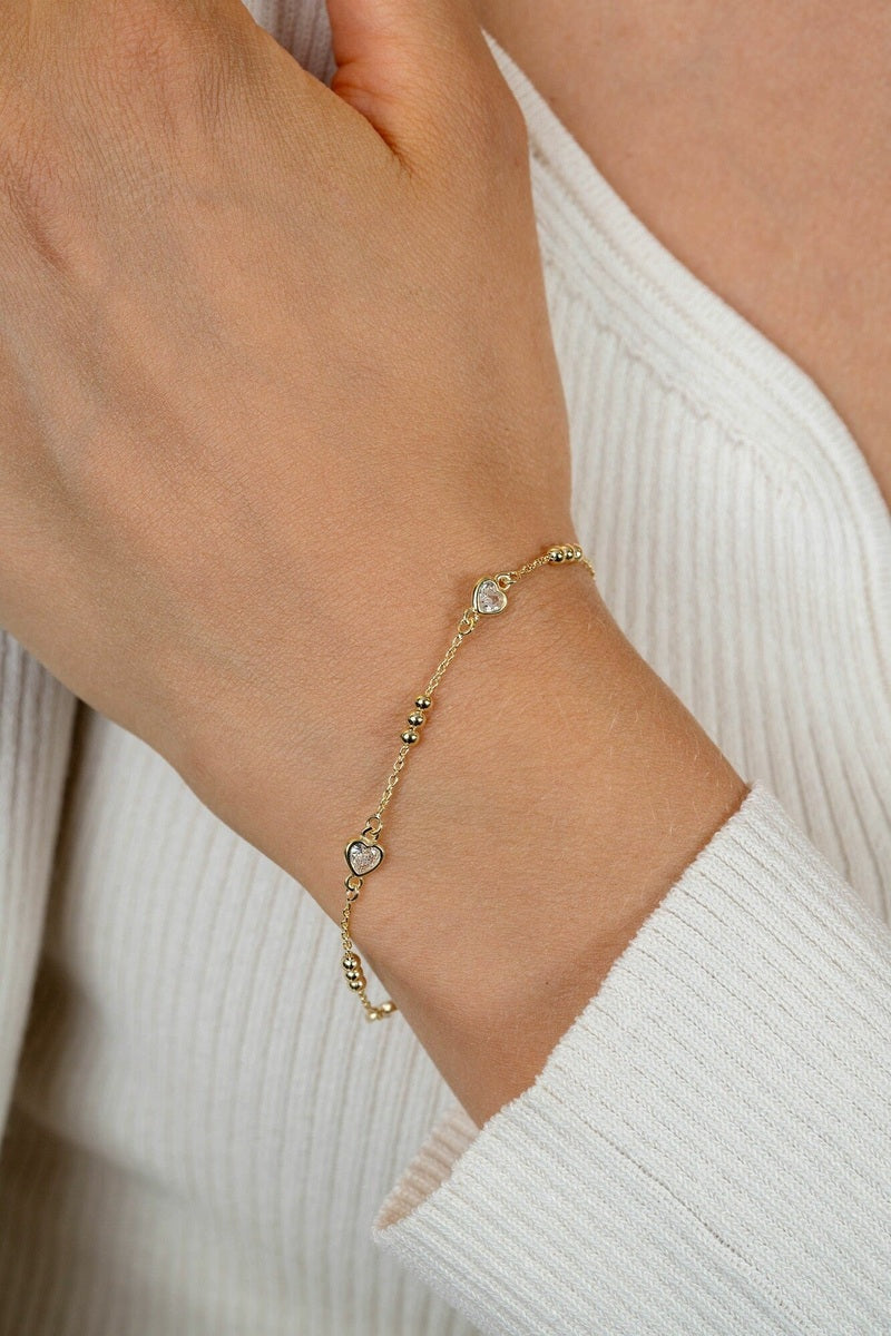 ZINZI gold plated zilveren schakelarmband met trio-bolletjes en drie hartvormige zirkonia's 17-20cm - ZIA2679