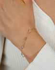ZINZI gold plated zilveren schakelarmband met trio-bolletjes en drie hartvormige zirkonia's 17-20cm ZIA2679 - PansiteNederland.nl