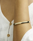 bangle scharnier massief ovale buis 7 mm Zilgold (geelgoud met zilverkern) - PansiteNederland.nl