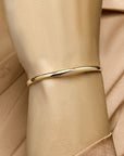 bangle scharnier massief ovale buis 4,0 mm Zilgold (geelgoud met zilverkern)