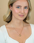 ZINZI gold plated zilveren oorstekers in druppelvorm met witte zirkonia's 17mm ZIO2708Y - PansiteNederland.nl