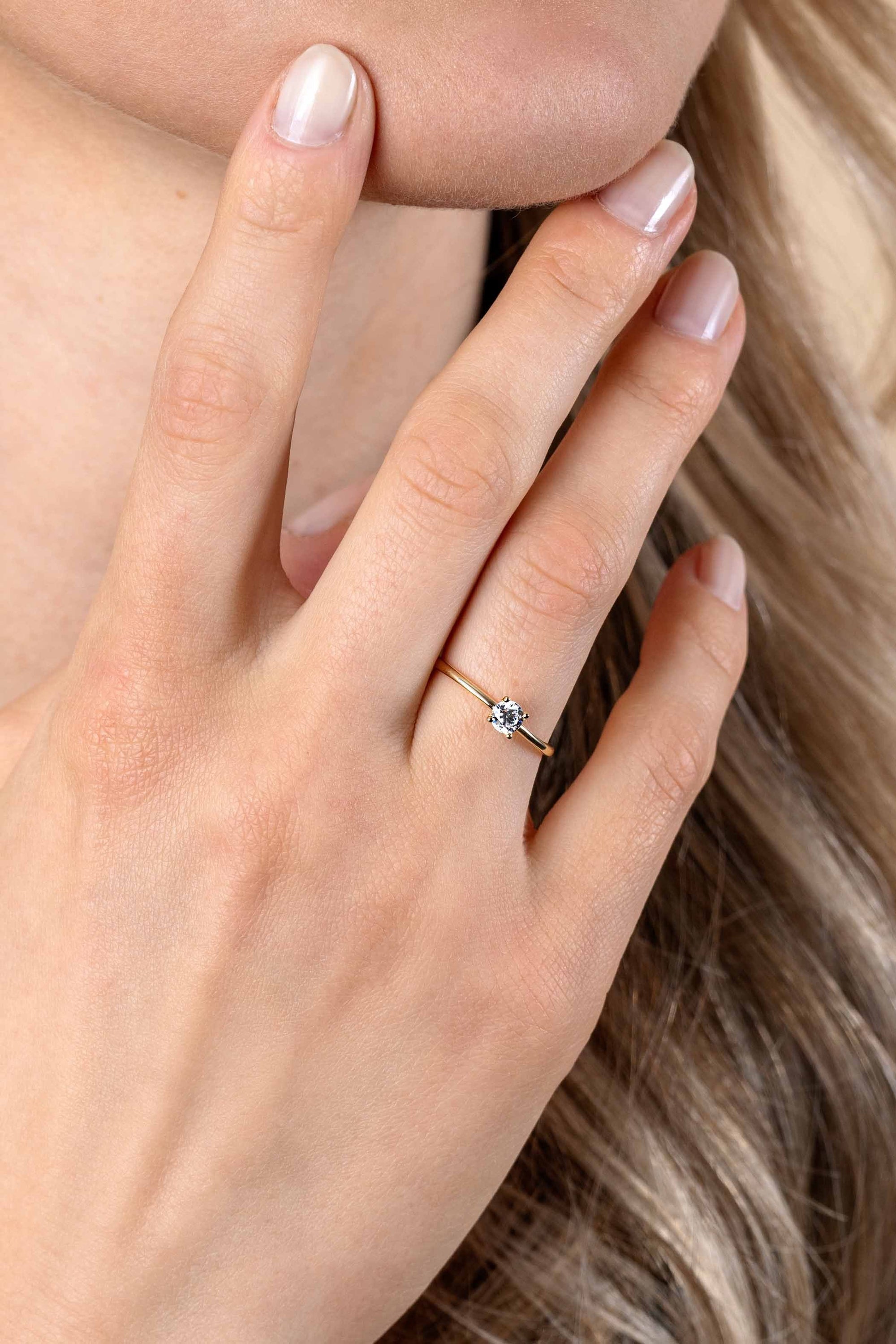 ZINZI Gold 14 krt gouden ring bezet met een ronde witte zirkonia in vierpootszetting (4mm) ZGR385 - PansiteNederland.nl