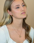 ZINZI gold plated zilveren oorstekers in druppelvorm met golvende rij witte zirkonia's 17mm ZIO2707Y - PansiteNederland.nl