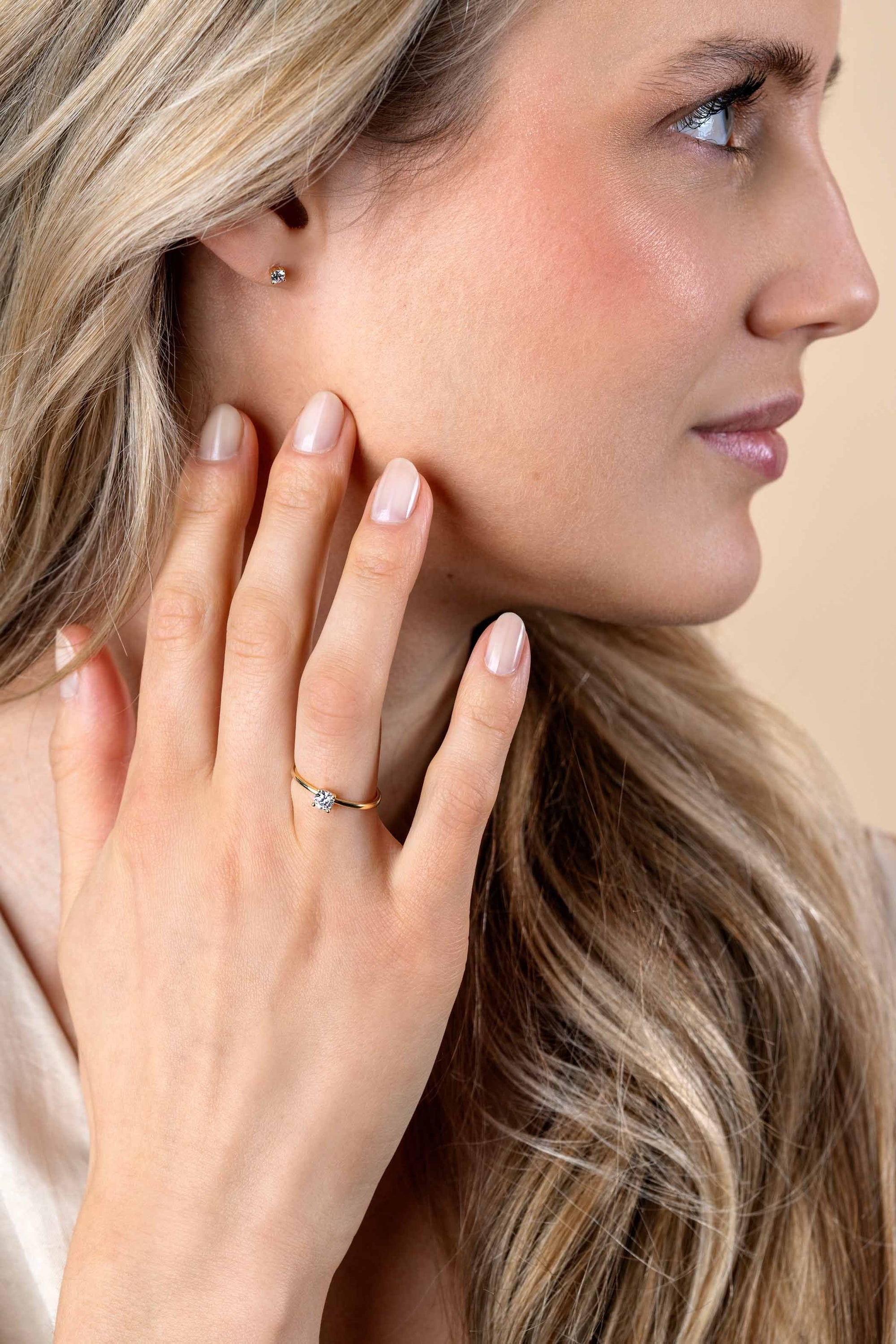 ZINZI Gold 14 krt gouden ring bezet met een ronde witte zirkonia in vierpootszetting (4mm) ZGR385 - PansiteNederland.nl