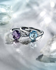 Gerhodineerd Zilver Ring Trilogie Met Zirkonia En Blauw Topaas 1337796