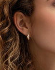 Sparkling Jewels Oorbellen | Tube Huggies Gold - CZ EAG35 - PansiteNederland.nl