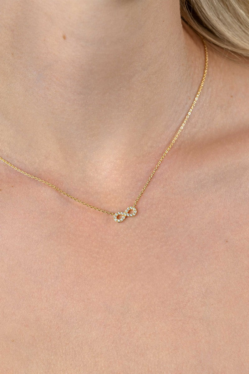 ZINZI gold plated zilveren ketting met Infinity teken, vol bezet met witte zirkonia's 42-45cm ZIC2597Y - PansiteNederland.nl