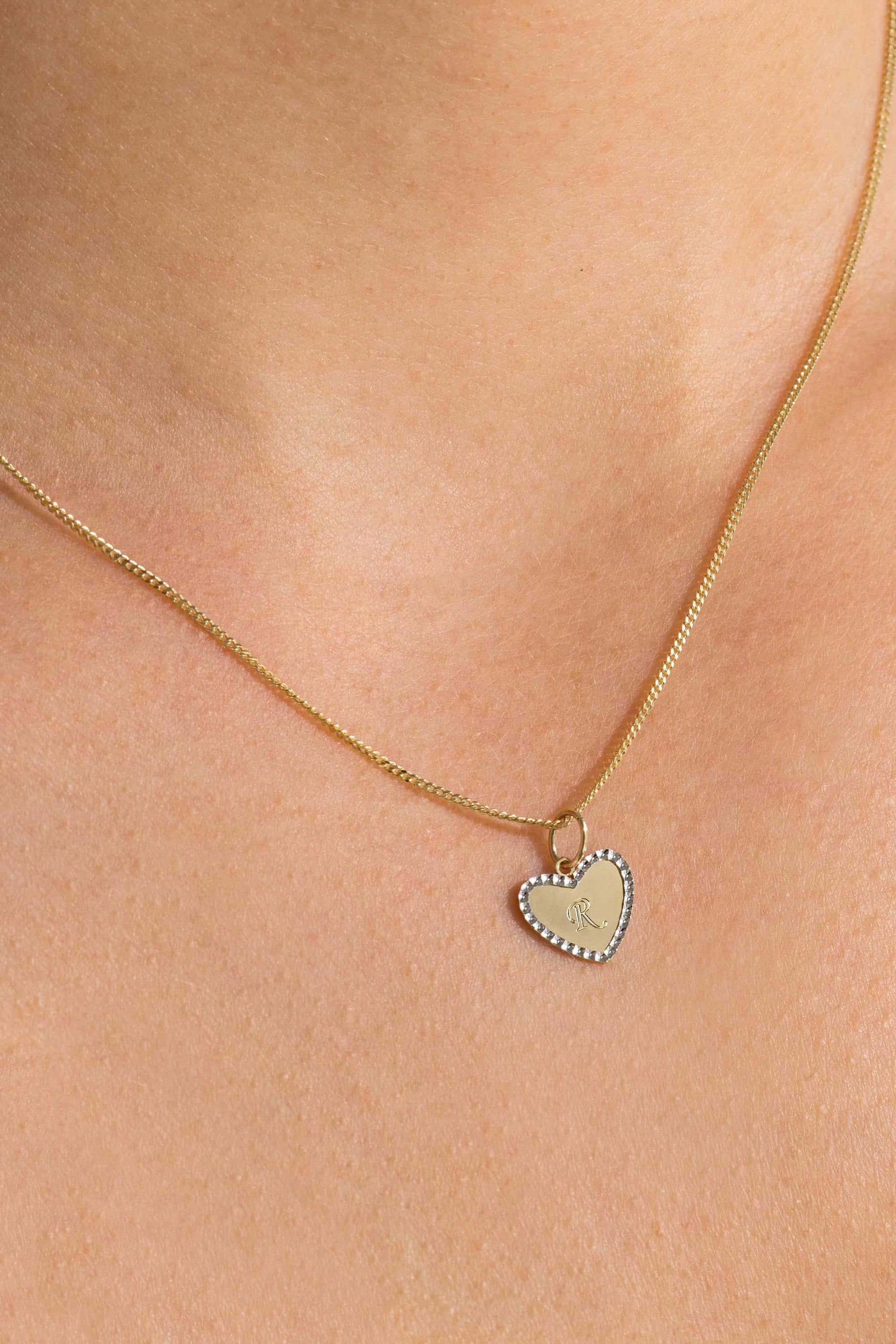 Zinzi Gold 14 krt gouden hanger met glanzend hartje van 10mm en met chique witgouden parelrand ZGH364-10 (zonder collier) - PansiteNederland.nl