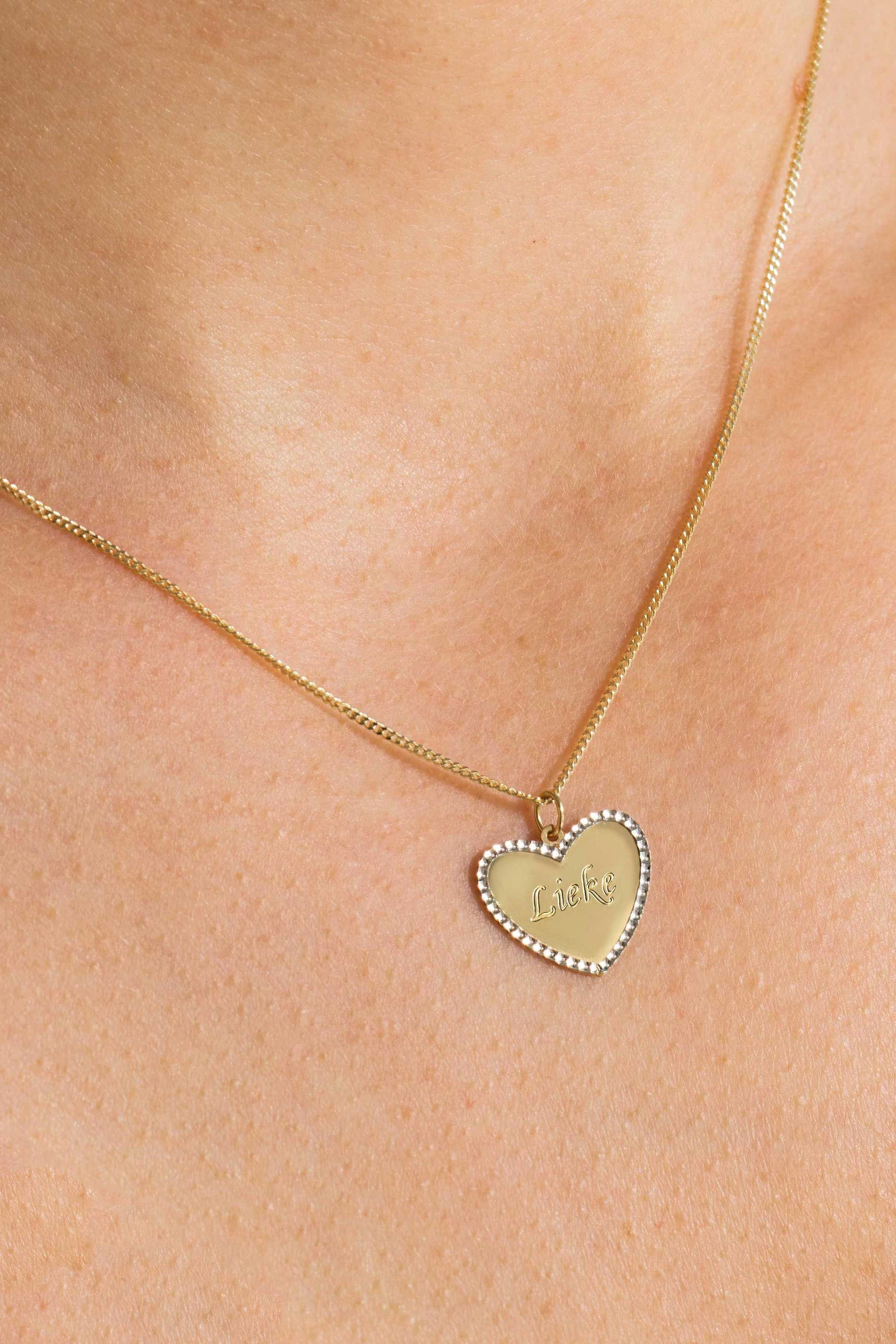 Zinzi Gold 14 krt gouden hanger met glanzend hartje van 15mm en met chique witgouden parelrand ZGH364-15 (zonder collier)