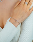 ZINZI zilveren armband 2 open rondjes verbonden wit ZIA1782