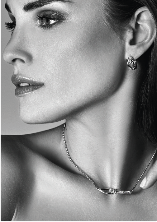Mart Visser by ZINZI zilveren luxe oorbellen 18x8mm geknoopte vorm bezet met witte zirconia's MVO19