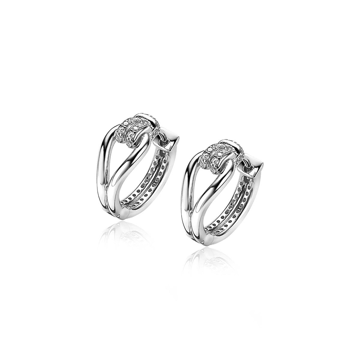 Mart Visser by ZINZI zilveren luxe oorbellen 18x8mm geknoopte vorm bezet met witte zirconia's MVO19