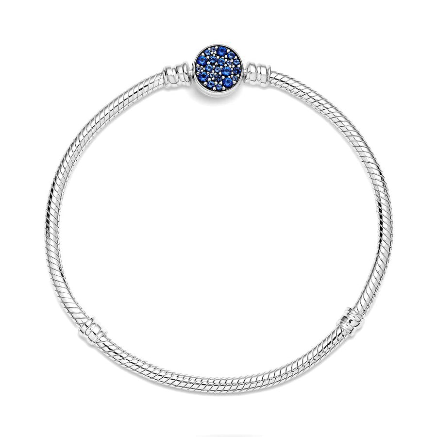 Snake chain sterling silver bracelet with disc clasp with stellar blue crystal 599288C01