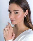 Zinzi zilveren luxe bicolor cross-over oorringen (16 x 7mm) rond glad witte zirkonia's ZIO2020, exclusief en kwalitatief hoogwaardig. Ontdek nu!