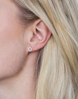 Zinzi zilveren oorknoppen open rond wit 6,5mm ZIO1063, exclusief en kwalitatief hoogwaardig. Ontdek nu!